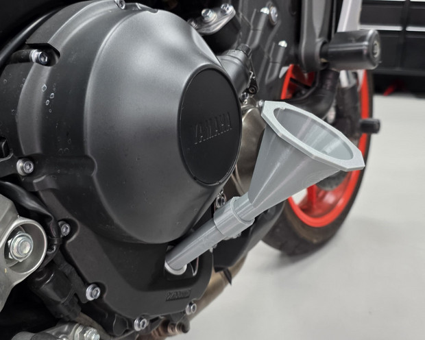 <h2><span style="text-decoration:underline"><strong>SCREW-IN FUNNELS</strong></span></h2><p><br/>Make oil changes quicker, cleaner, and completely stress-free with our screw-in funnels — the perfect pit-lane upgrade for your workshop or garage.<br/><br/>• Screws securely into your engine<br/>• Allows two hands to fill the oil<br/>• No pooling & no spills<br/>* <strong>Available for a wide range of bikes</strong></p><h4>From: £12.99</h4>